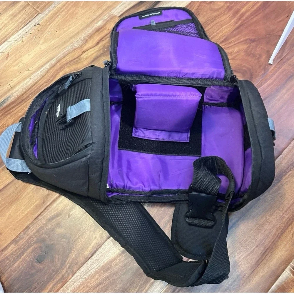 Black Alturo Slingshot Bag- Padded Two Compartments‎ Adjustable Inserts Purple